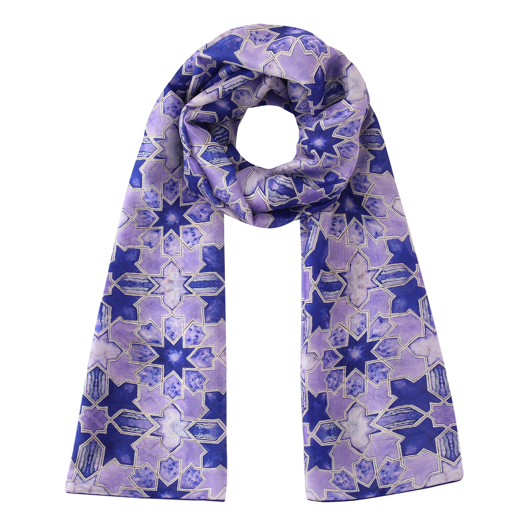 The Purple Silk Scarf with Islamic Art Print Sevilla showcases geometric star patterns in purple and blue, arranged with one end looped through to create a stylish circular knot at the top.