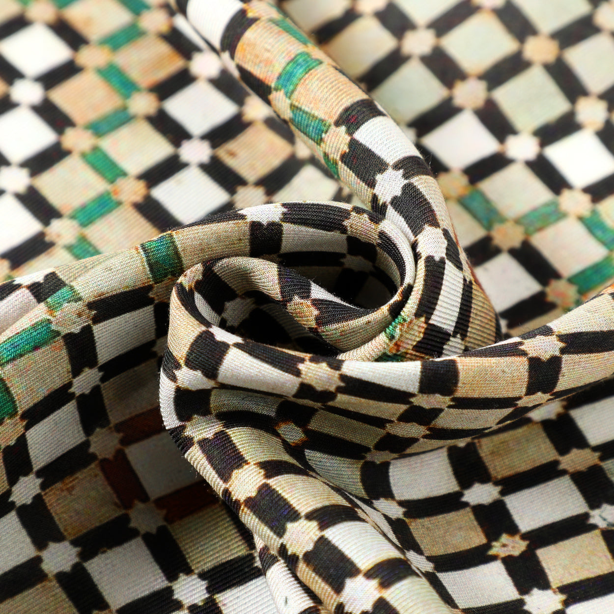 Detailed texture of a modal scarf showcasing a mosaic tile pattern