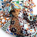 Detail of moroccan tiles inspired colorful scarf