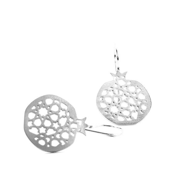 Close-up of Platónicas Sterling Silver Hook Earrings Granada No.4, showcasing artisan-crafted lace-like circular designs with pomegranate motifs and star shapes, set against a plain white background.