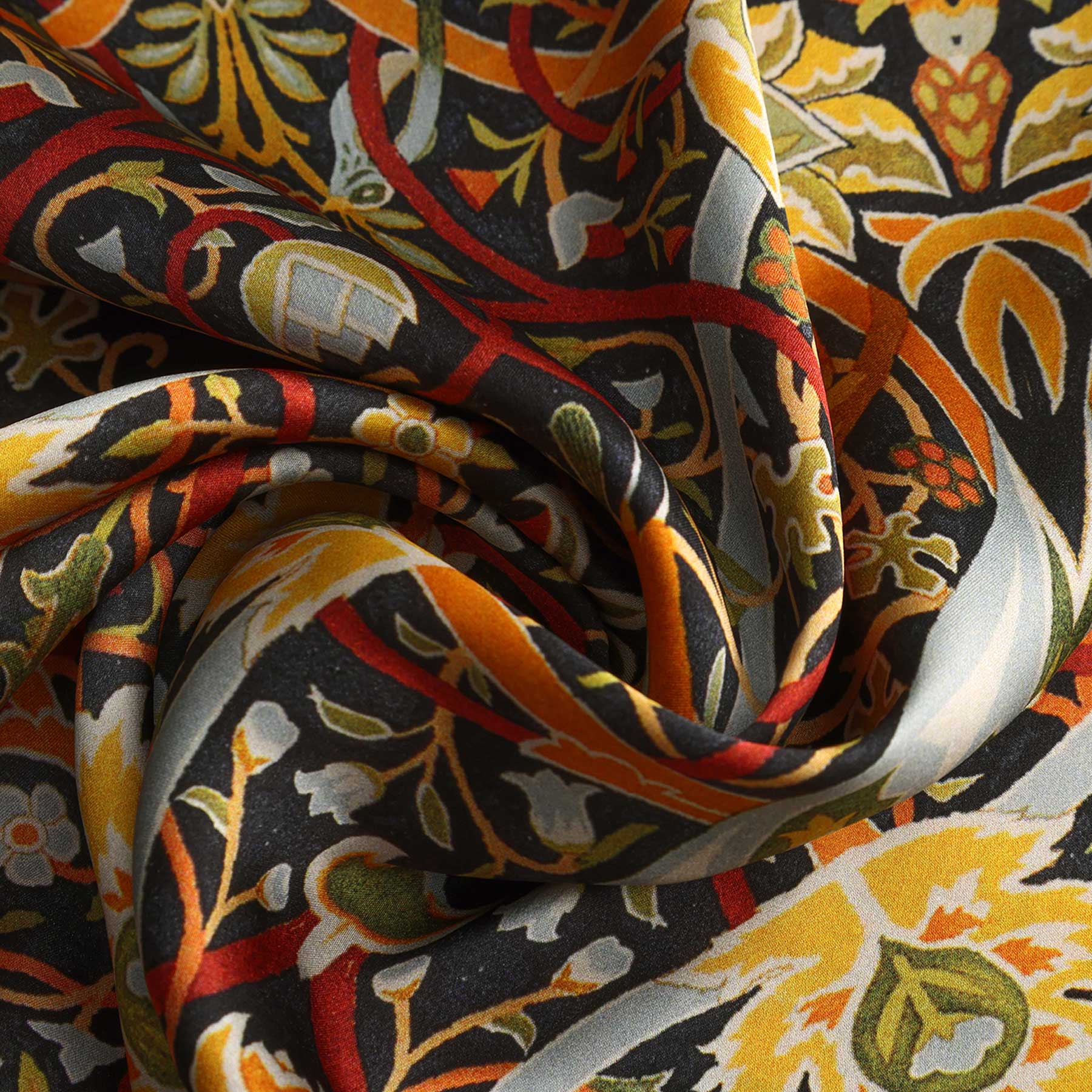 A close-up of the Vintage Floral Silk Scarf with Ornate Bird & Bloom Motifs, featuring vivid yellow, orange, green, black