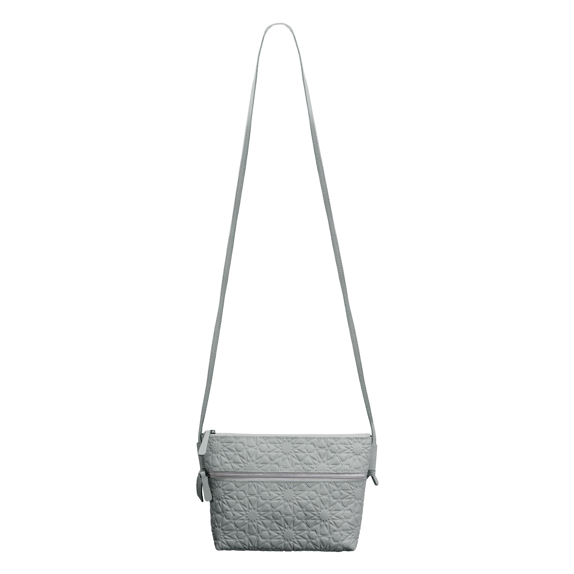 Gray Embossed Crossbody Bag with Islamic Design Pattern (Copia) featuring a long adjustable strap, zipper closure, and decorative embossed detailing on the front.