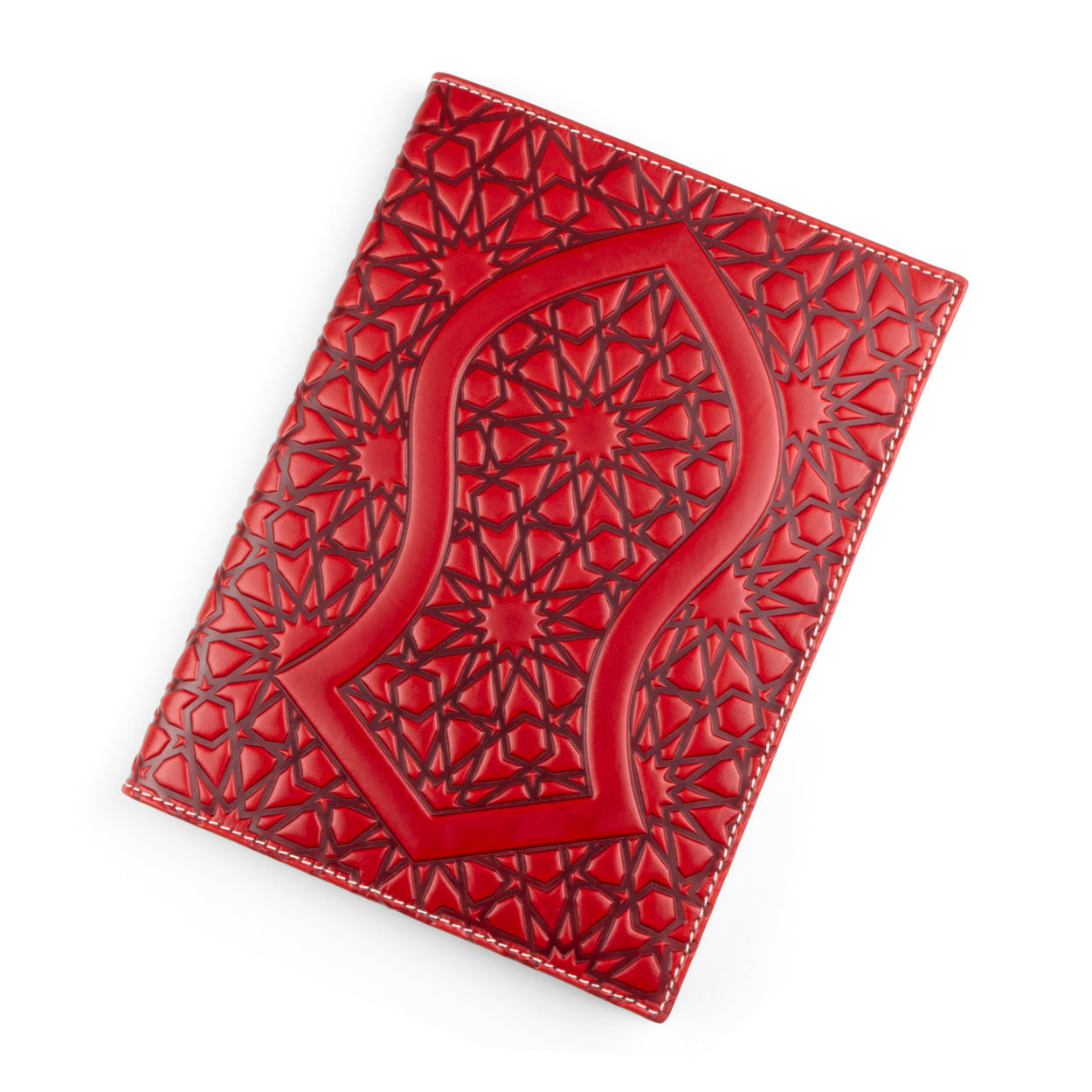 A striking red leather notebook cover embossed with a detailed Islamic geometric pattern. The central motif is inspired by the sacred Nalayn, the sandal of the Prophet Muhammad (SAW), surrounded by intricate stars and polygonal shapes. The cover is outlined with white stitching.