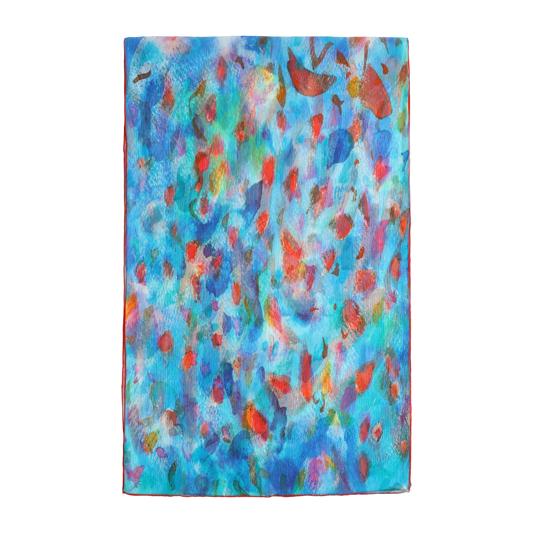 The Multicolor Silk Scarf Mar Rojo features abstract orange fish swimming in vivid blue and green hues, with bold brushstrokes that evoke underwater movement—making this muslin silk scarf a striking piece of wearable art.