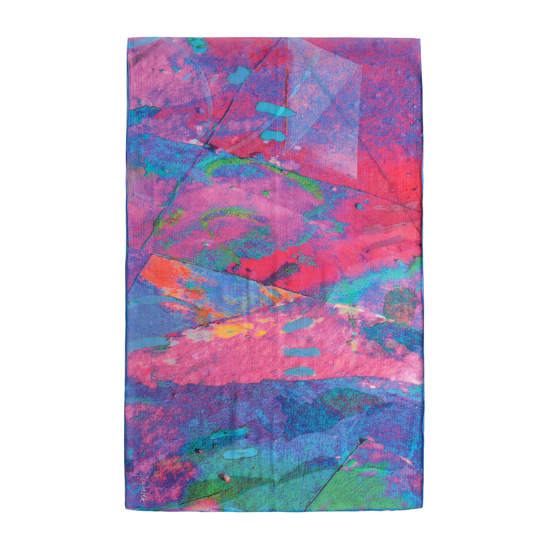 The Multicolor Silk Scarf Océano Fucsia features an abstract pattern in pink, purple, blue, and green with overlapping brush strokes and geometric shapes—wearable artwork inspired by Mediterranean designs.