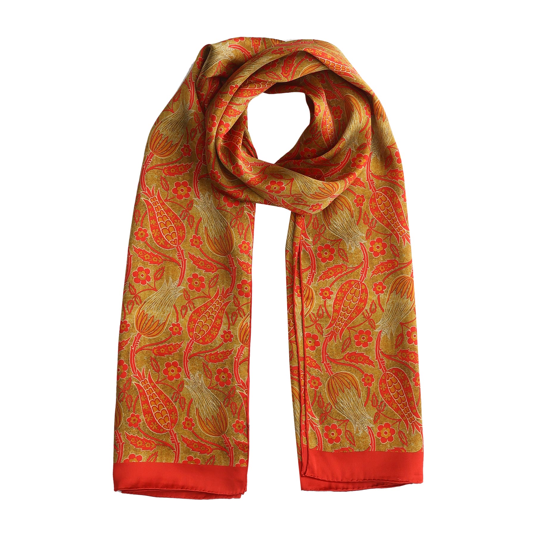 Long floral silk scarf casually draped, displaying a mix of red and gold motifs for a luxurious, statement-making piece.