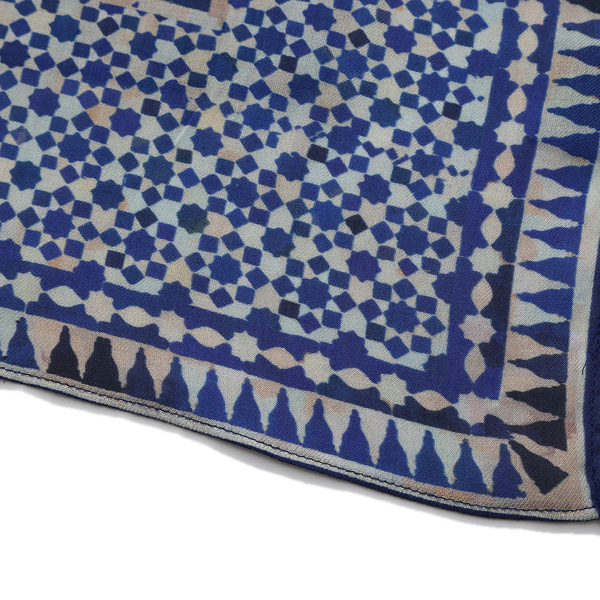 Folded corner of the Blue Modal Scarf Andalusian Tiles Almunia, showing the border and the hem