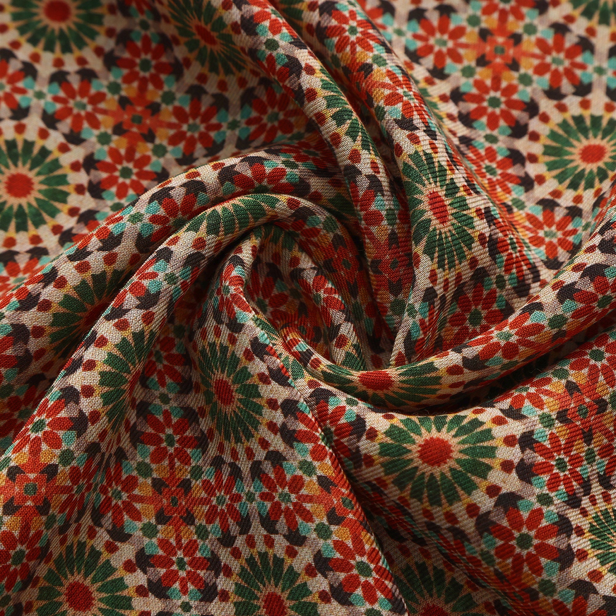 Close-up of the 056 modal print: the terracotta and green rosettes on sand