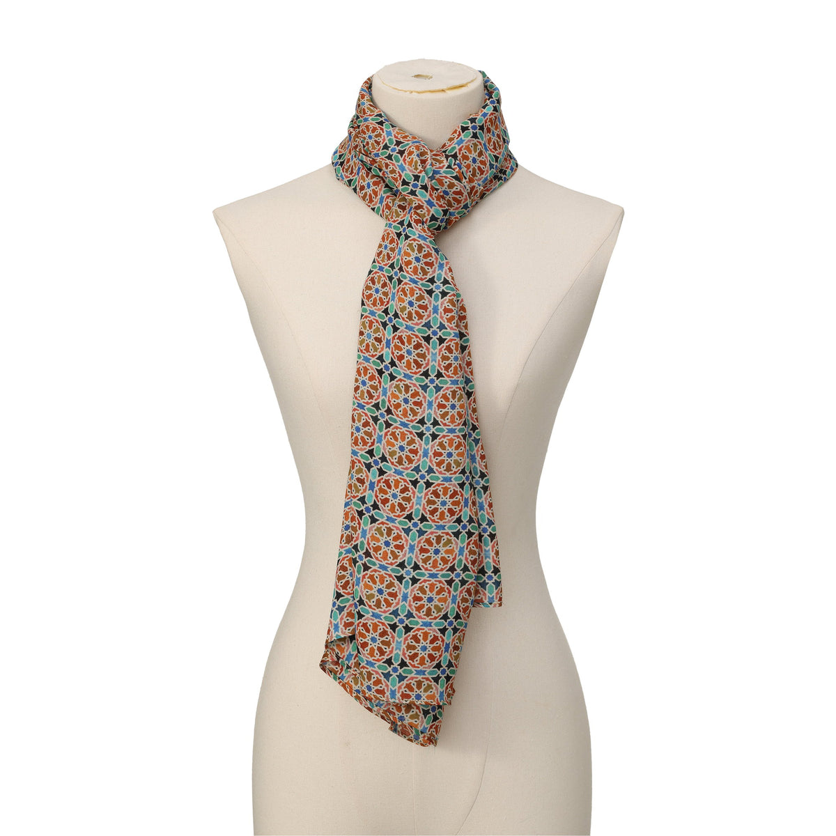 Orange Modal Scarf Mosaic Wheels Wallada draped around the neck on a mannequin bust