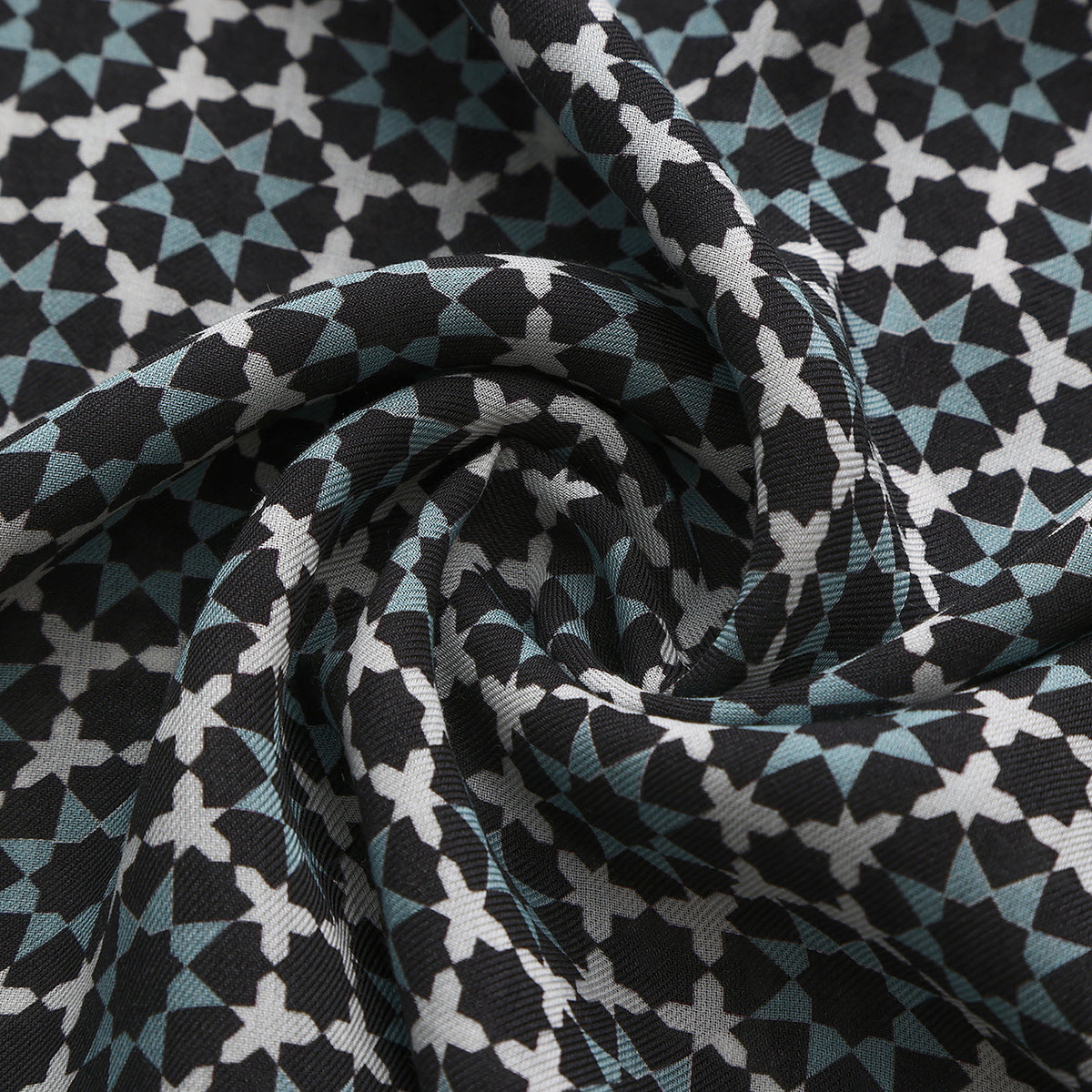 Close-up of the 058 modal print: the black and slate grey star lattice