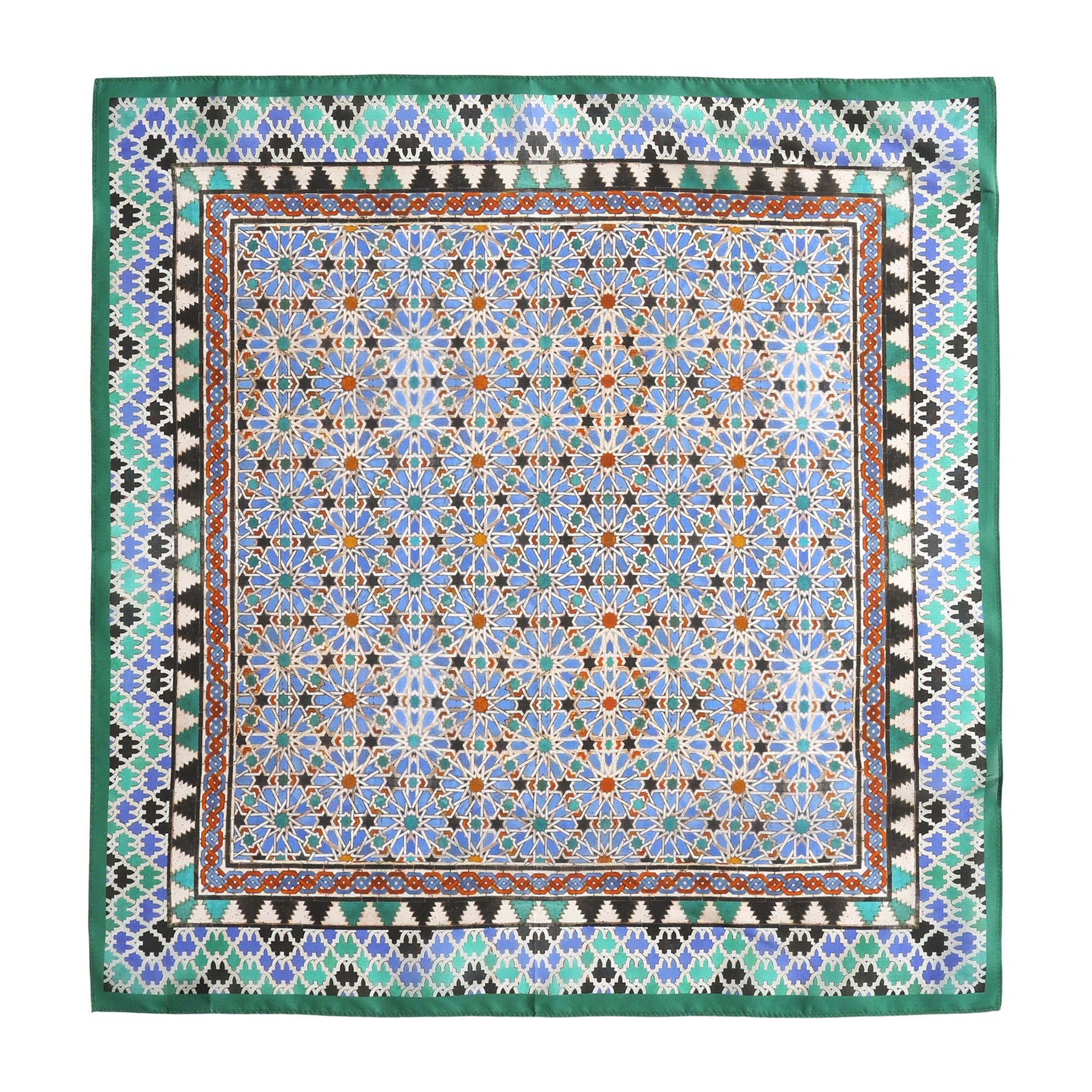 The Alhambra Art Silk Square Scarf showcases an intricate geometric mosaic in blue, orange, white, and black with a green and black border, reflecting traditional Spanish tilework and craftsmanship.
