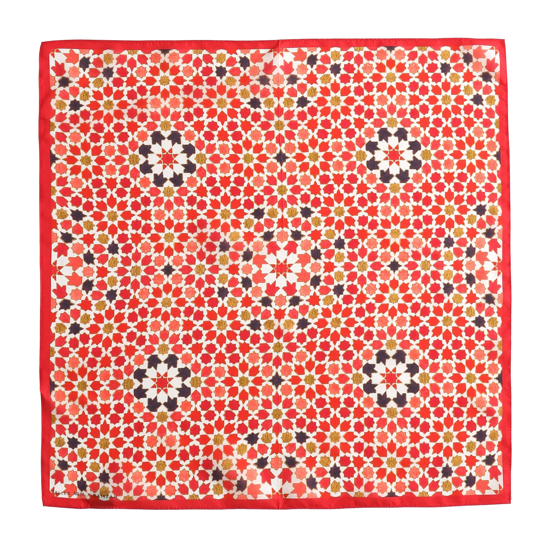 The Small Square Scarf Alhambra is a silk accessory inspired by Spanish craftsmanship, showcasing an intricate geometric floral pattern in white, yellow, pink, and black with a solid red border.