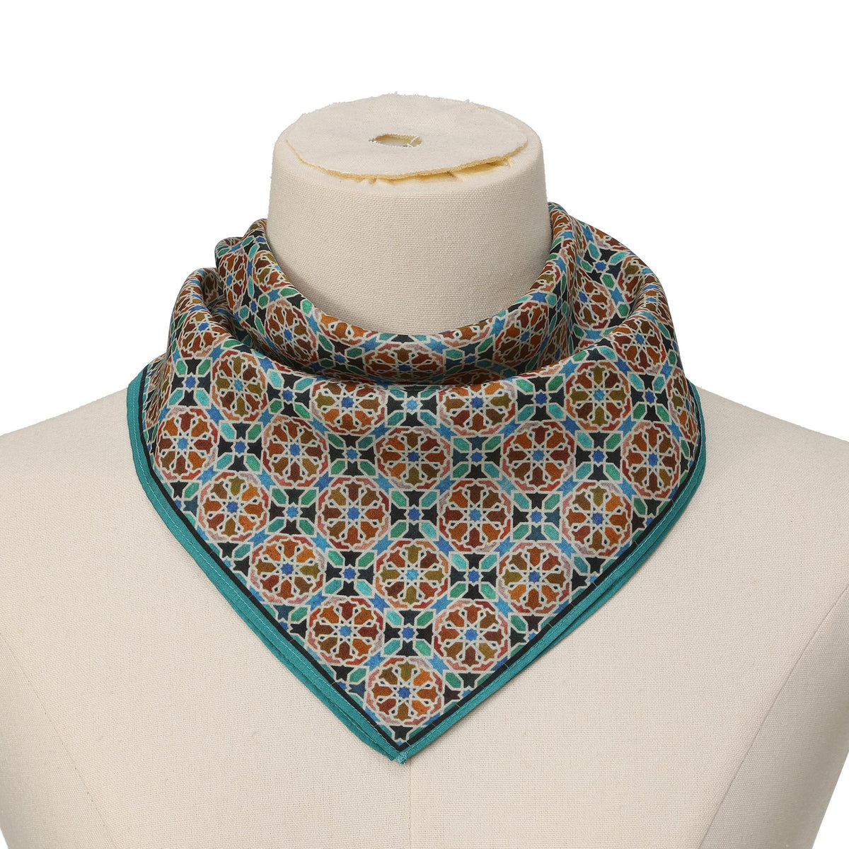 Orange Silk Square Scarf Wallada tied at the neck on a mannequin bust