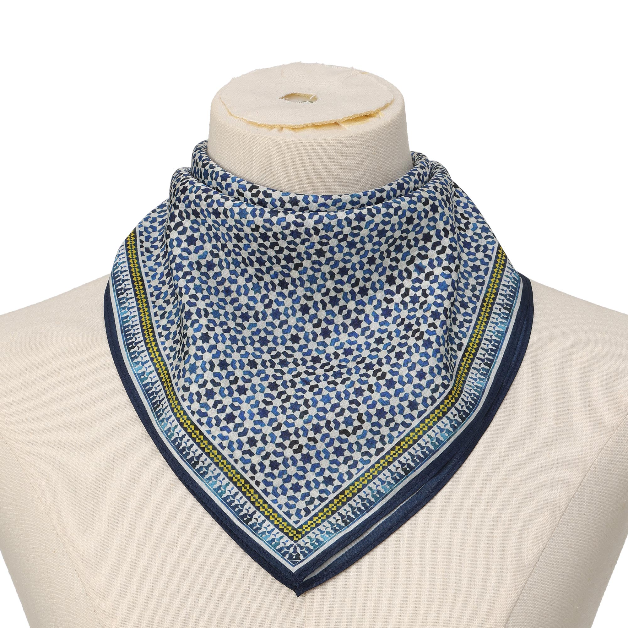 Blue Silk Square Scarf Basma tied at the neck on a mannequin bust