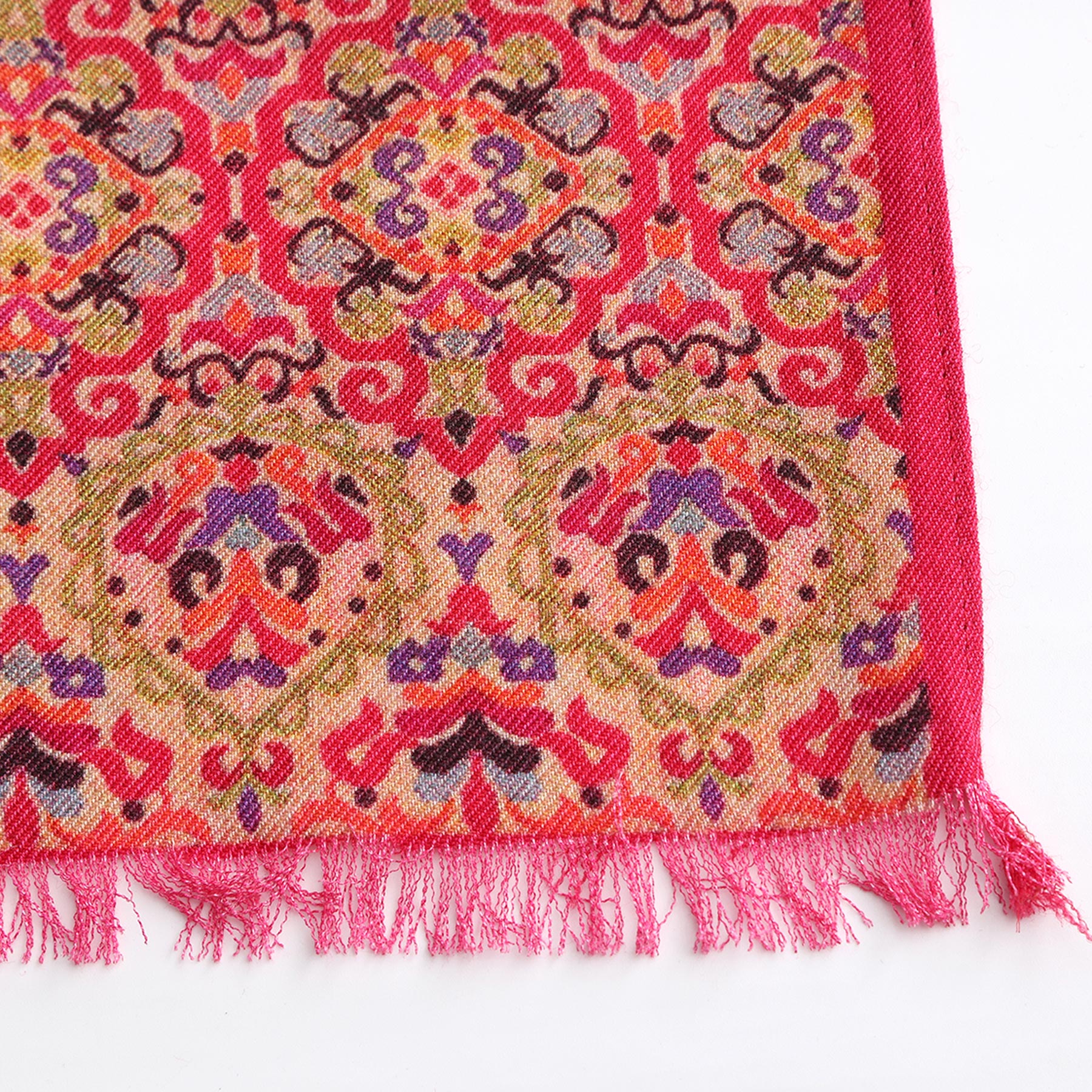 Close-up detail of Mihrah double-sided wool and silk scarf design