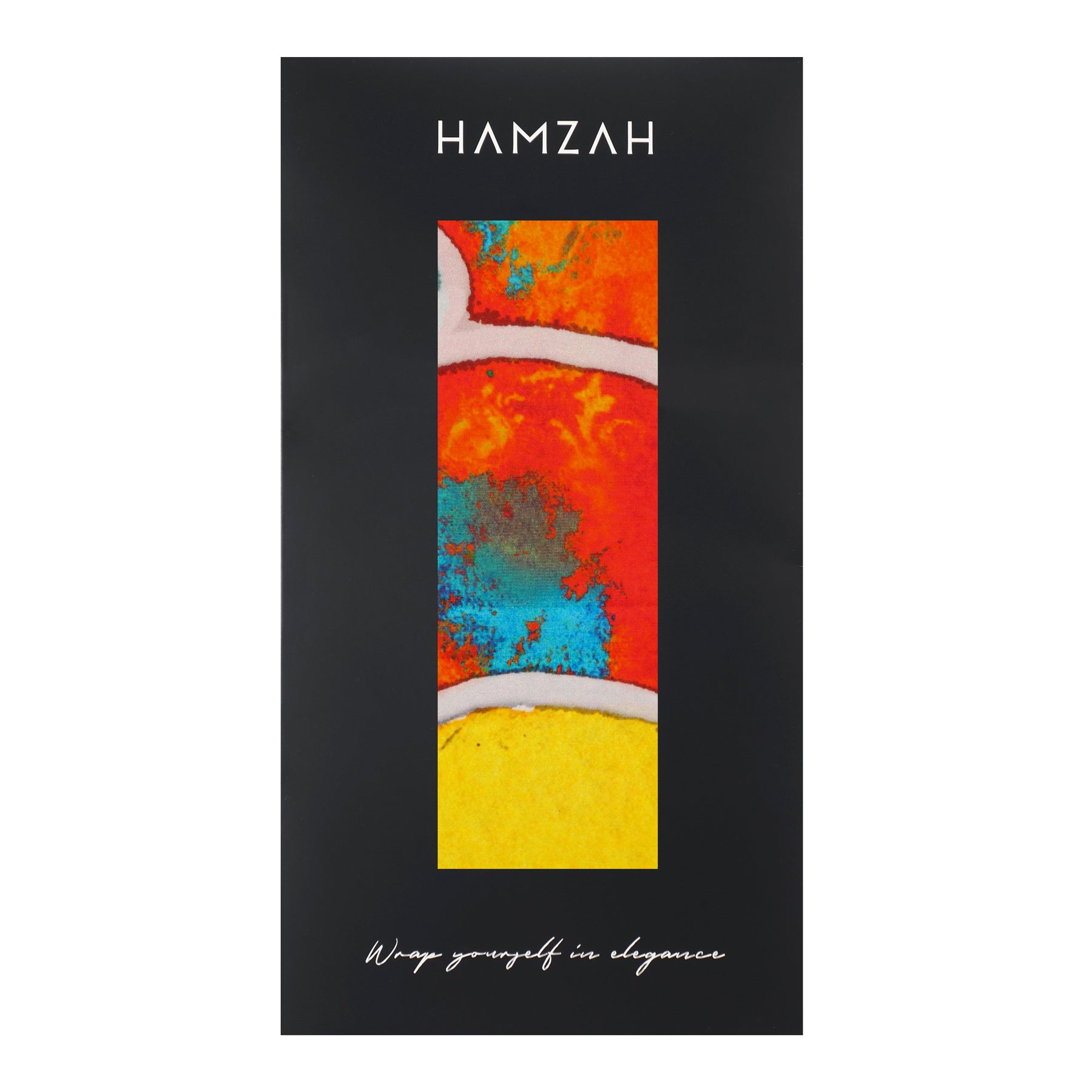 Rectangular black box with a vertical window displays the Multicolor Silk Shawl for Women in vibrant red, yellow, orange, blue, and white. HAMZAH is at the top; "Wrap yourself in elegance" is scripted at the bottom.