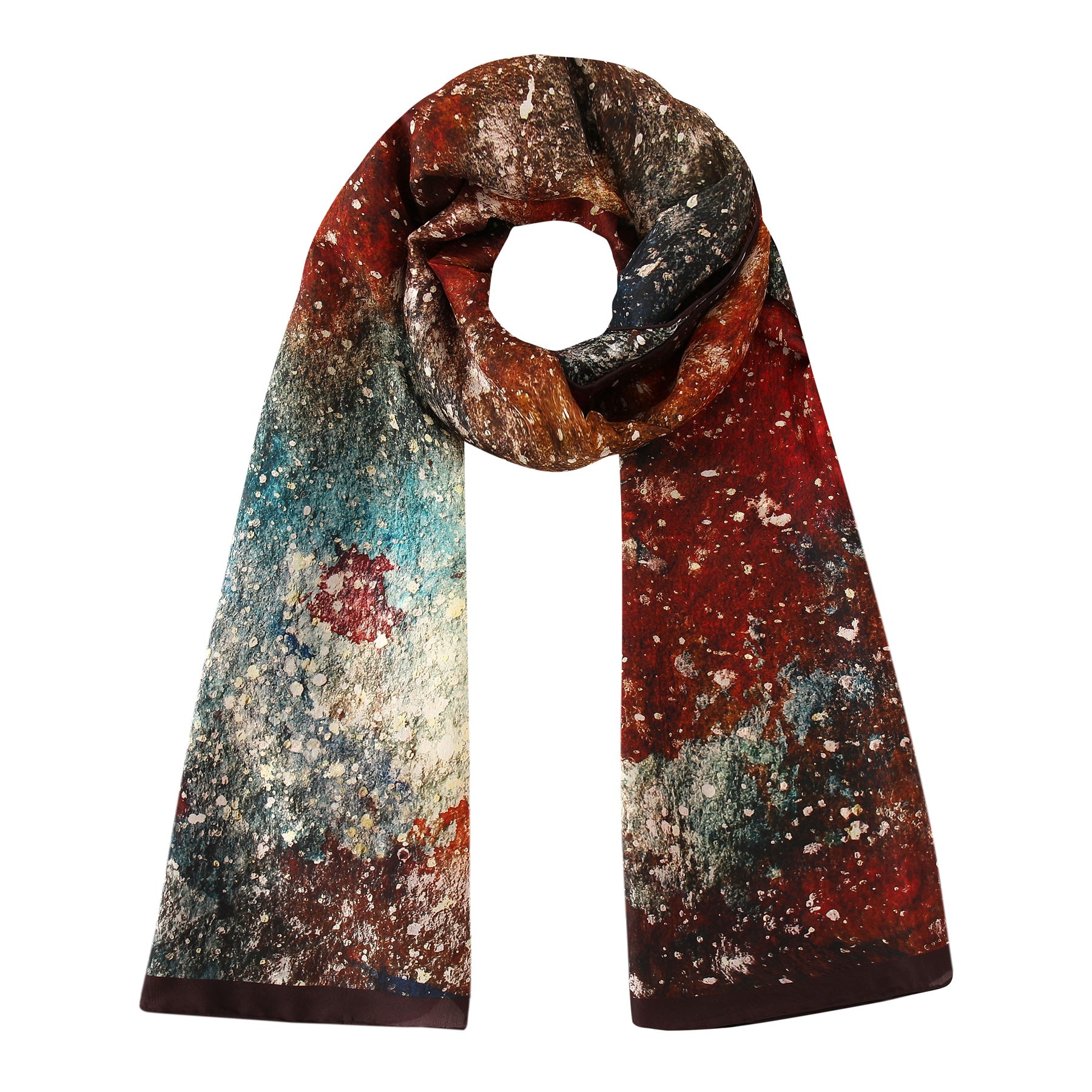 The Silk Foulard for Men Polvo Cósmico is a long, rectangular habotai silk scarf with an abstract, splattered pattern in red, blue, white, and brown, shown loosely looped on a white background.