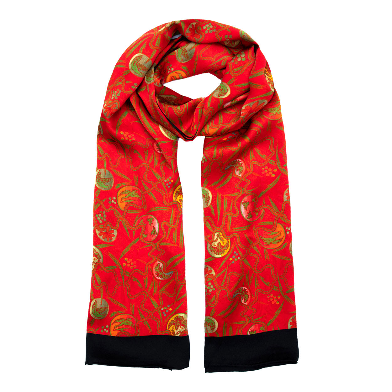 Draped red silk scarf showcasing playful green and gold organic patterns on a radiant crimson background.