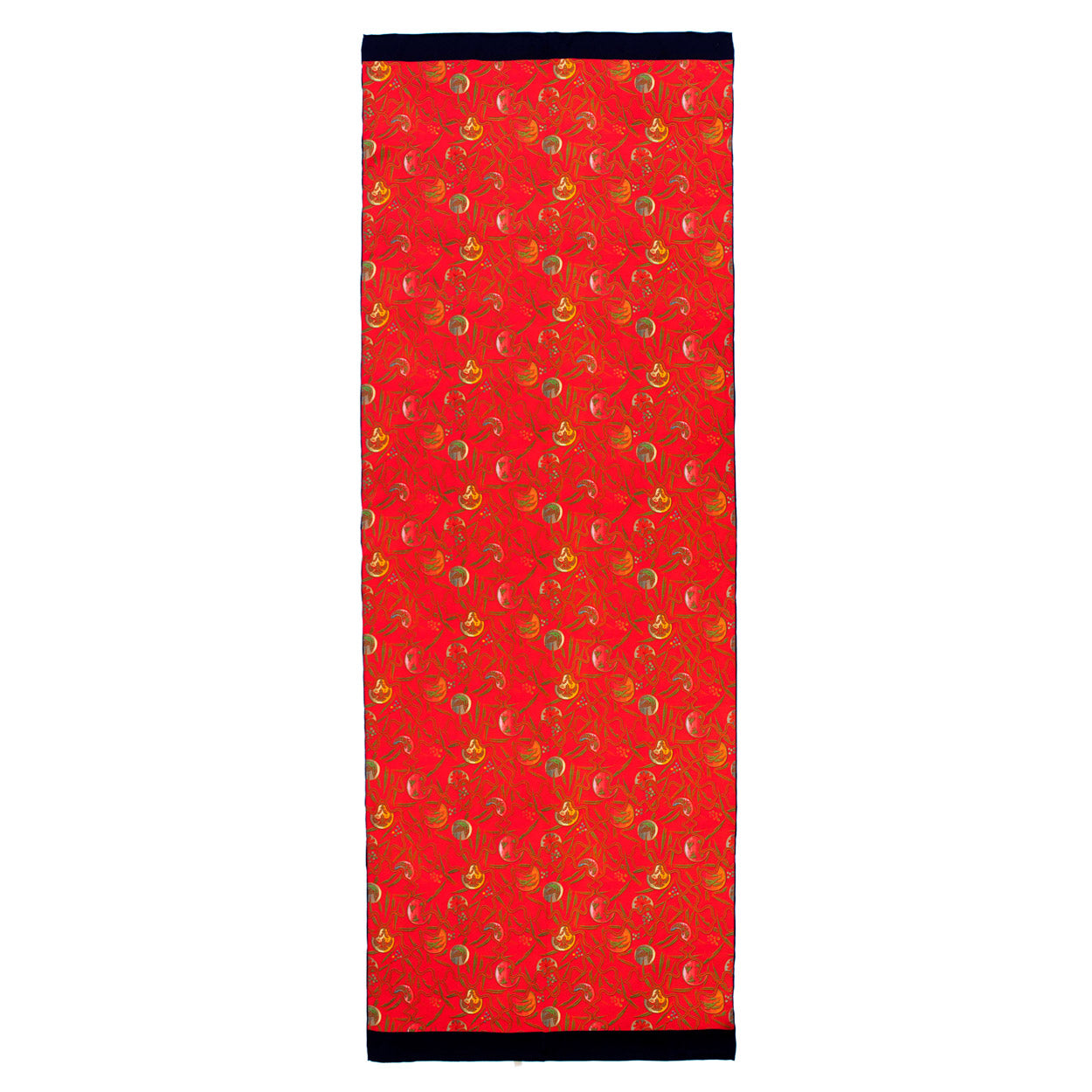 Full rectangular view of a red silk scarf from Hamzah, decorated with swirling green and gold motifs and finished with a black border