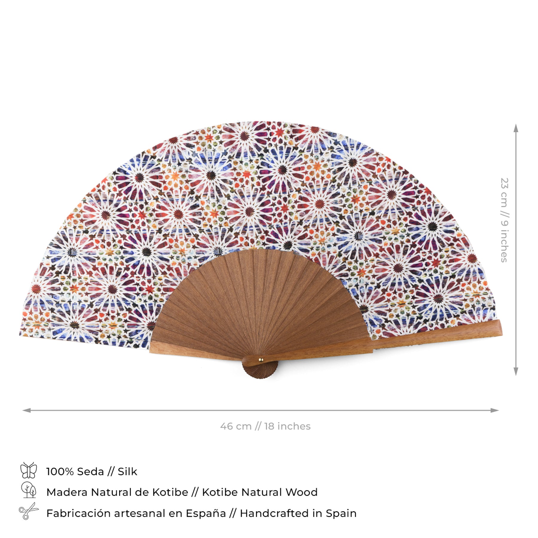 The Spanish Tiles Inspired Silk Hand Fan Sakina features a handcrafted premium silk fan with a wooden base and vibrant floral lace pattern, measuring 46 cm wide by 23 cm tall. Made in Spain, it showcases intricate designs inspired by Spanish tiles.