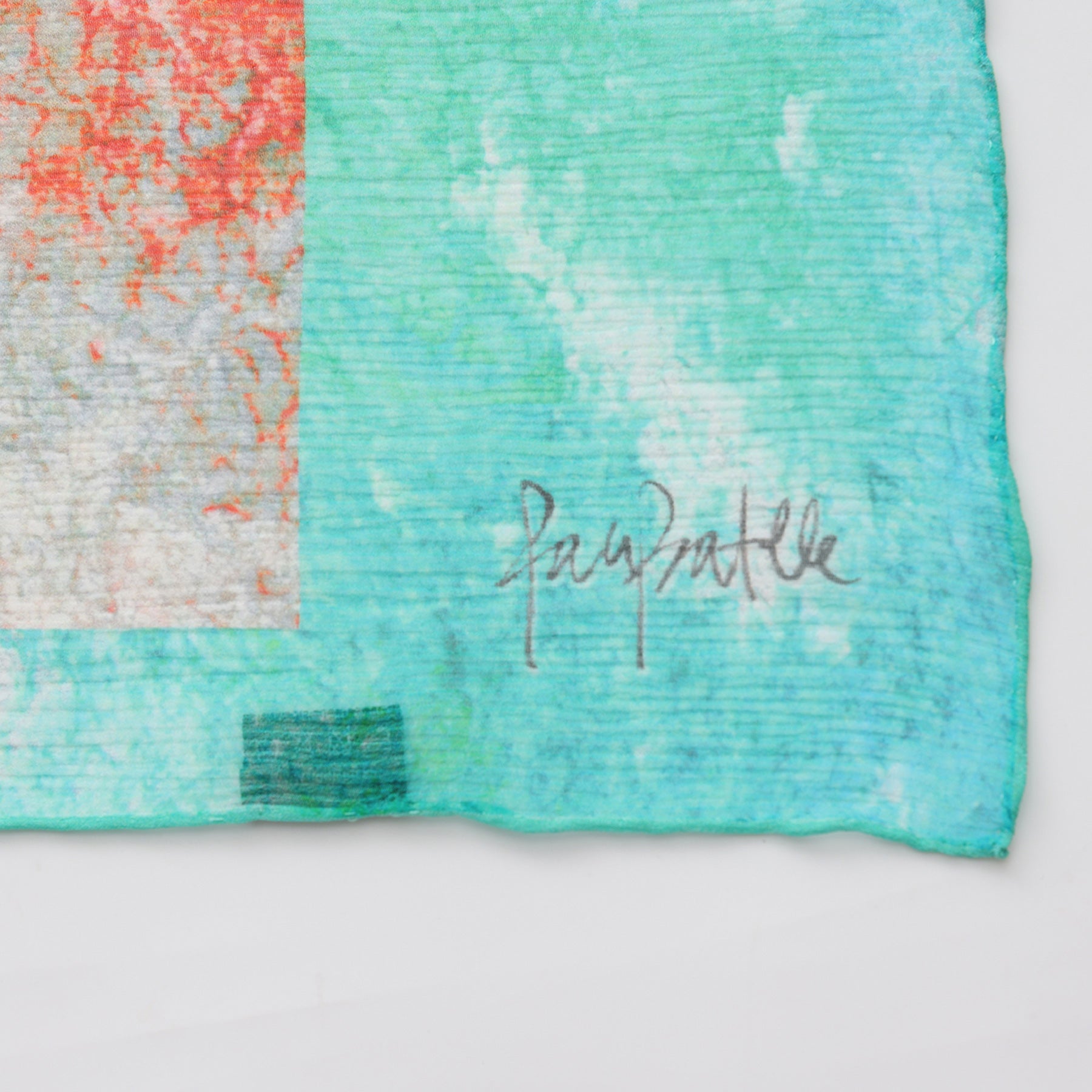A close-up of a textured artwork showing turquoise, green, red, and off-white—artist Paprathes gray signature appears lower right. Perfect inspiration for the Multicolor Silk Scarf Fucsia Paradis or as wearable art.