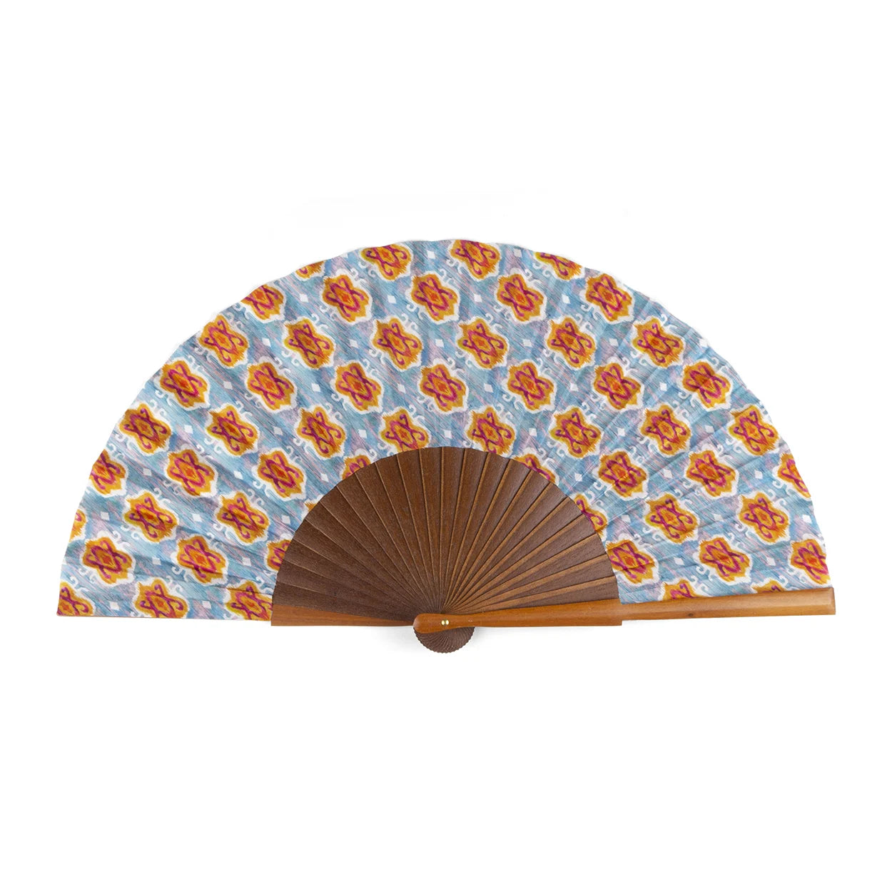 Front view of handcrafted silk fan with a vibrant geometric Ikat pattern and Bocapi wood handle.