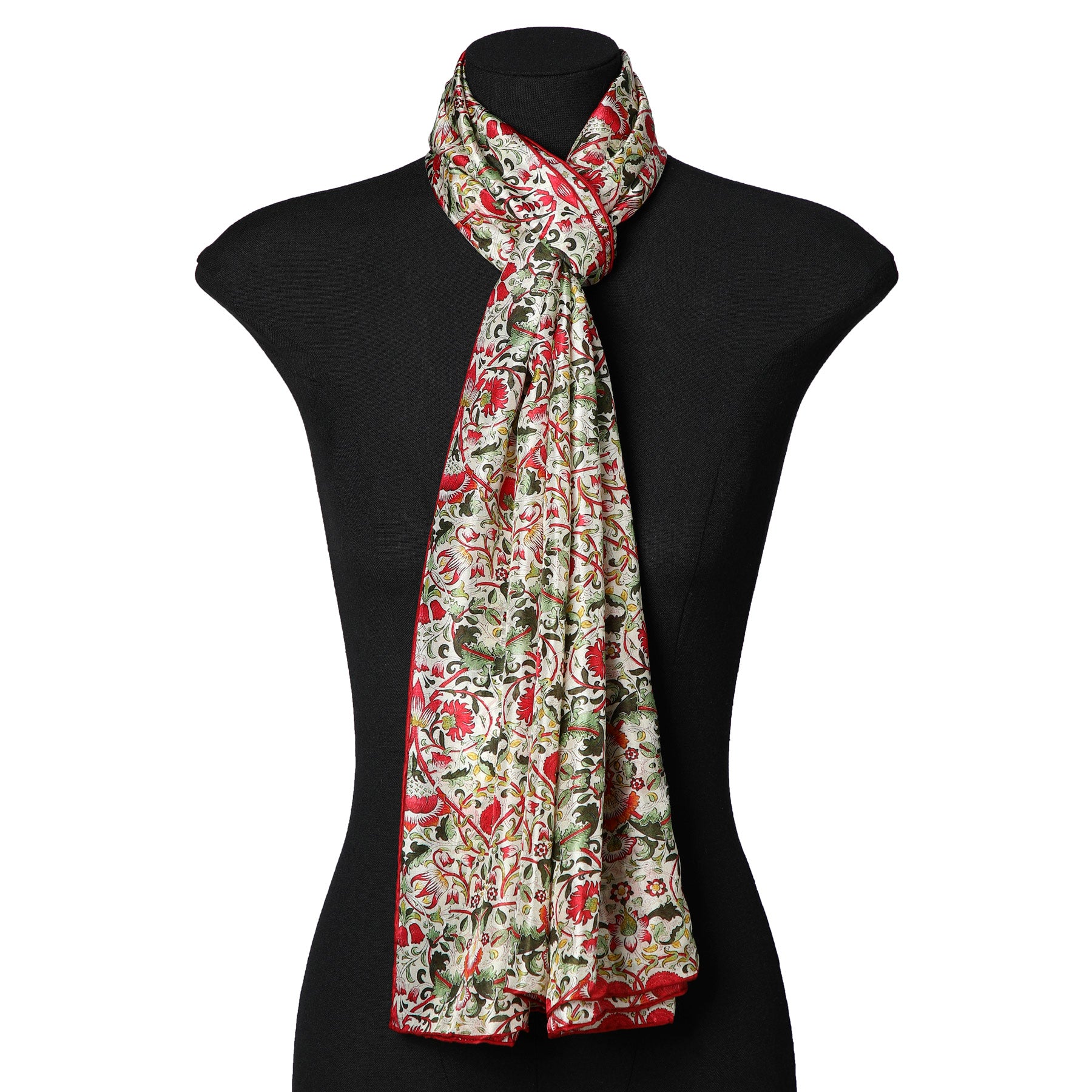 The William Morris inspired Silk Scarf - Margaret, featuring a vibrant floral design, is draped and tied around the neck of a black mannequin torso against a plain white background.