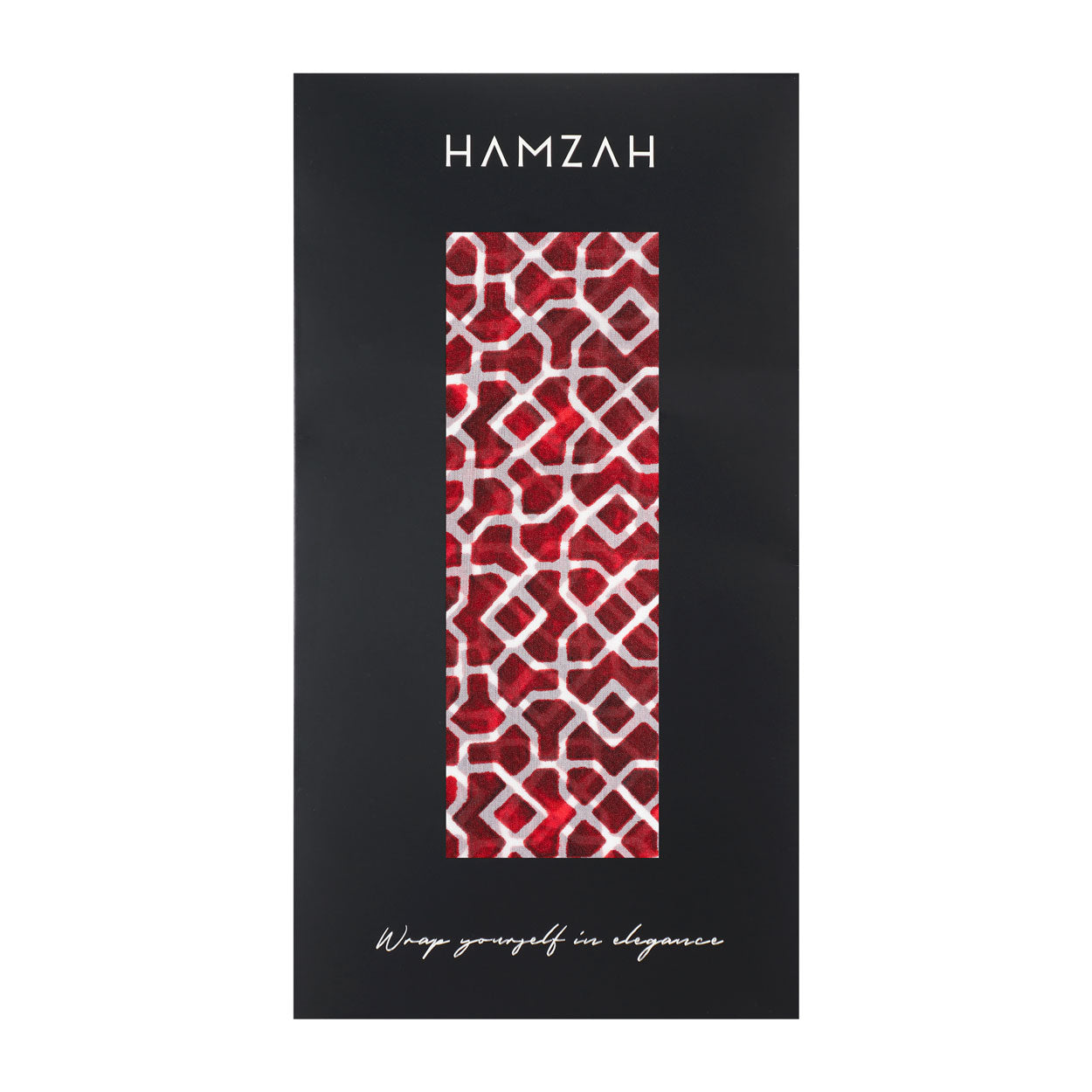 Luxury packaging of the Andalusian silk scarf by Hamzah, featuring a red and white geometric pattern visible through a sleek black box with elegant branding.