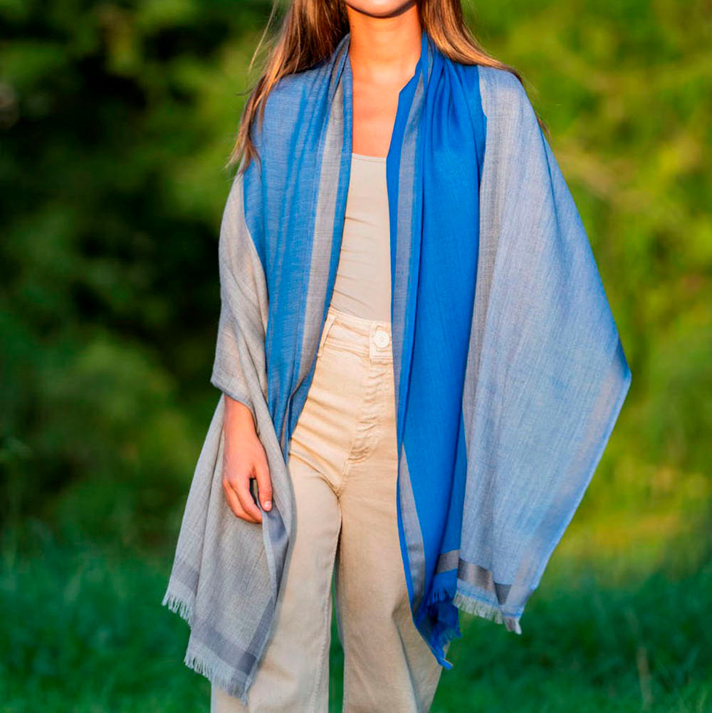 Woman featuring blue silk and wool scarf as shawl