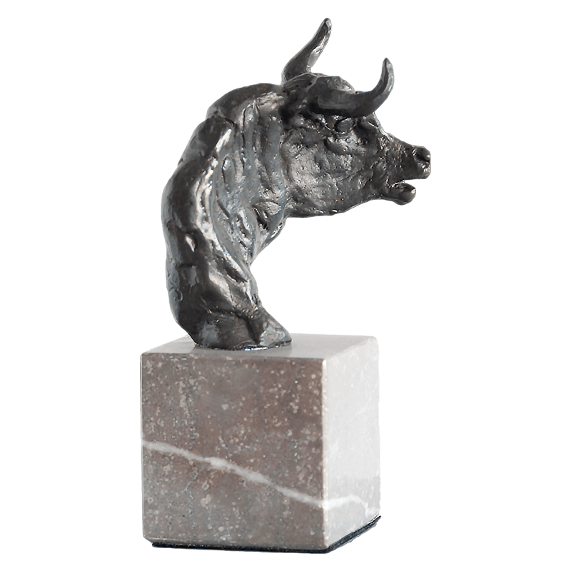 Bulls head sculpture on marble base lateral view