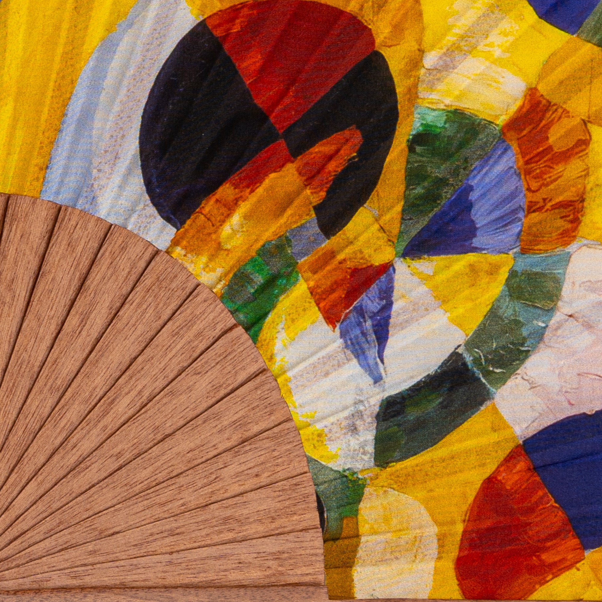 Close-up of the Robert Delaunay Print Hand Fan Elise showing the Robert Delaunay circular forms colourful print in detail.