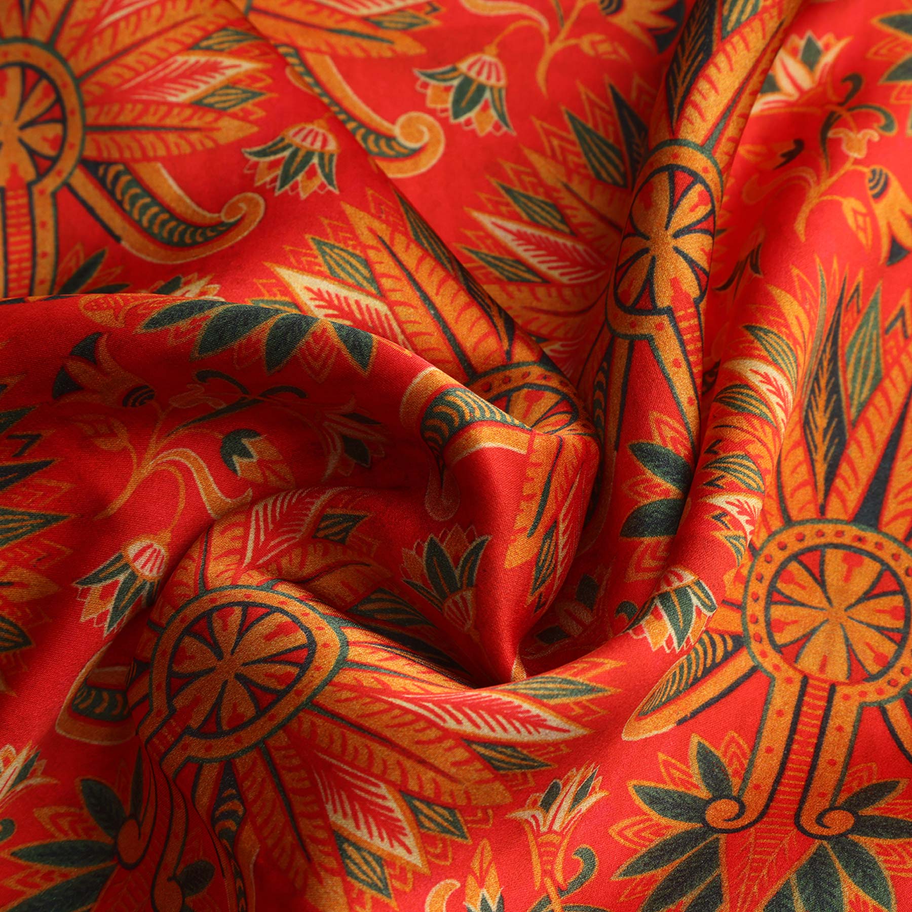 large red scarf featuring an art nouveau print