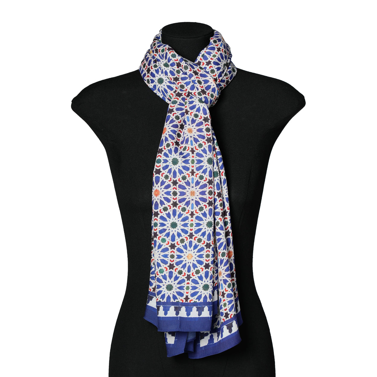 Mannequin showcasing an elegant blue scarf inspired by Islamic geometric patterns.