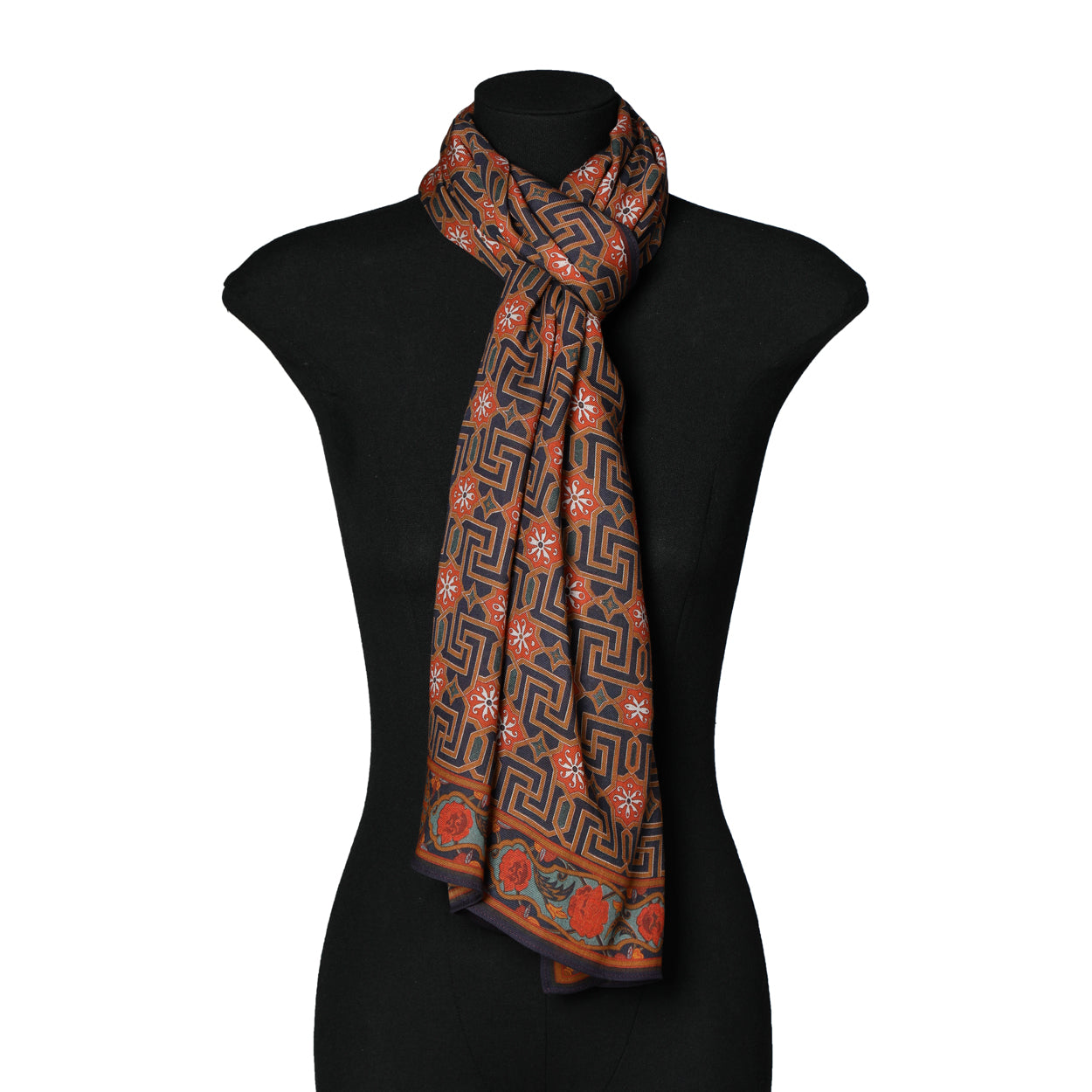 Mannequin wearing the Lyabi scarf styled as a neck wrap with Islamic art-inspired patterns.