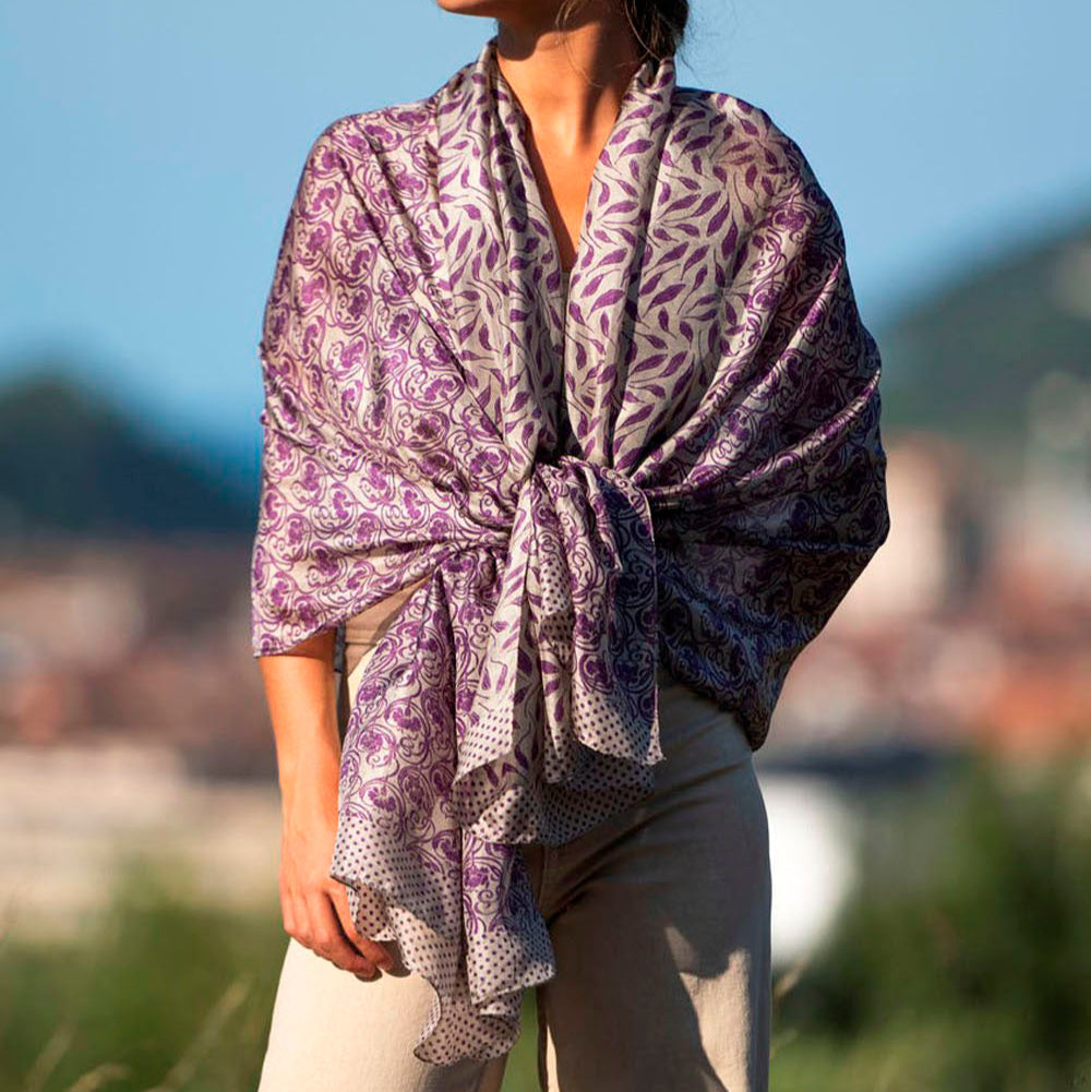 Women with purple silk scarf with floral print