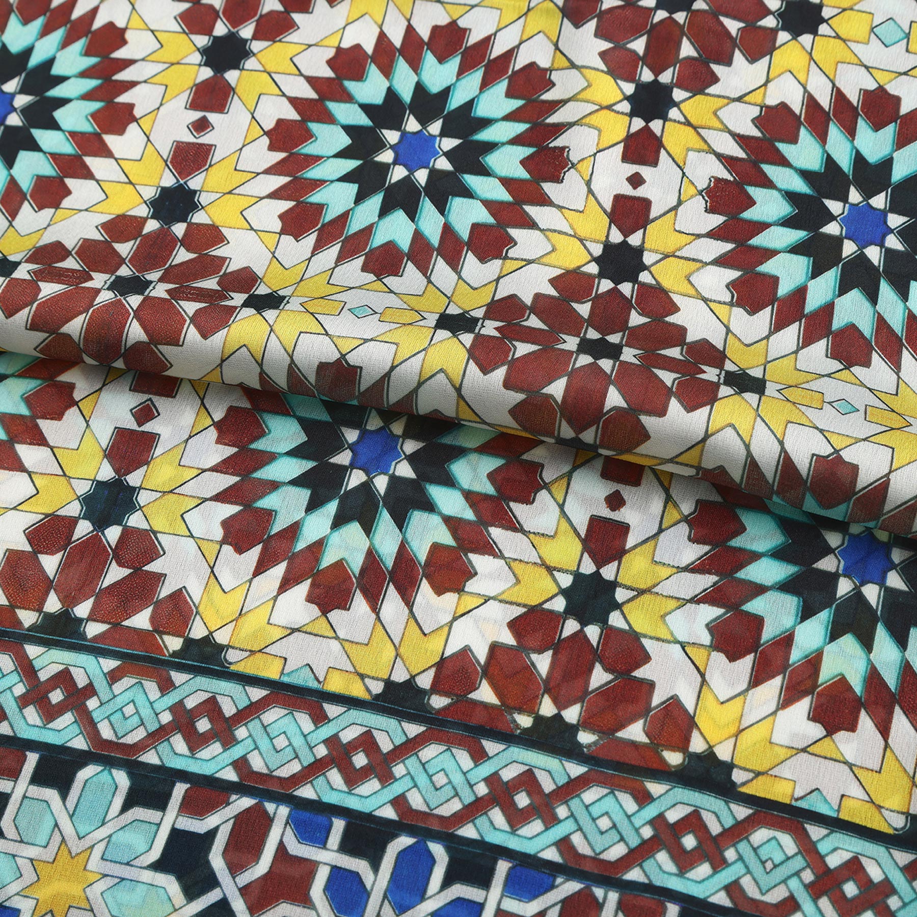 Pañuelo Raml – estampado de mosaico andalusí en burdeos y turquesa, detalle 3