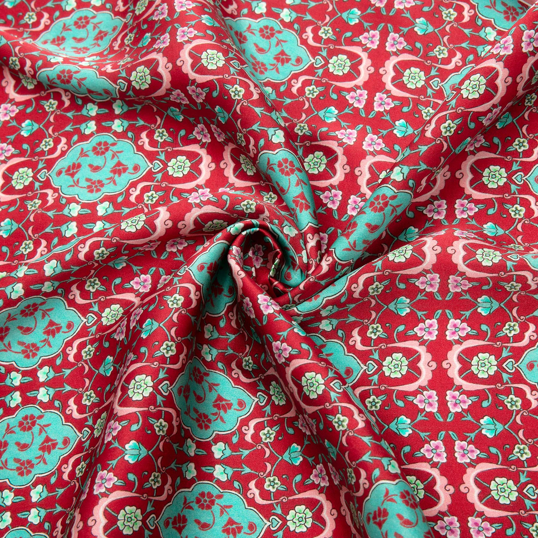 Close-up of the double-sided silk print of the Red and Turquoise Silk Scarf Koltuk · Double-Sided
