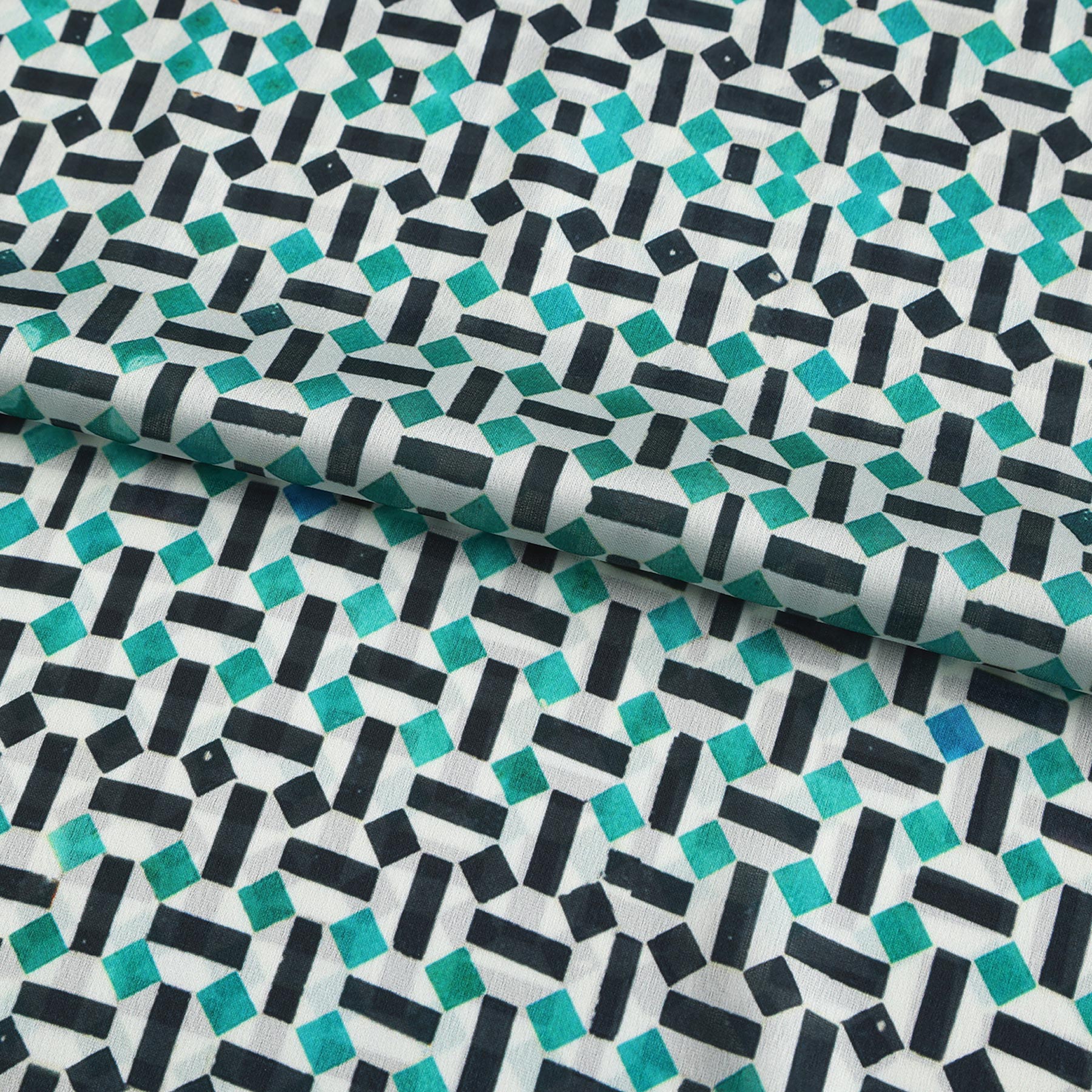 Pañuelo Sukun – estampado de mosaico andalusí en turquesa y negro, detalle 3