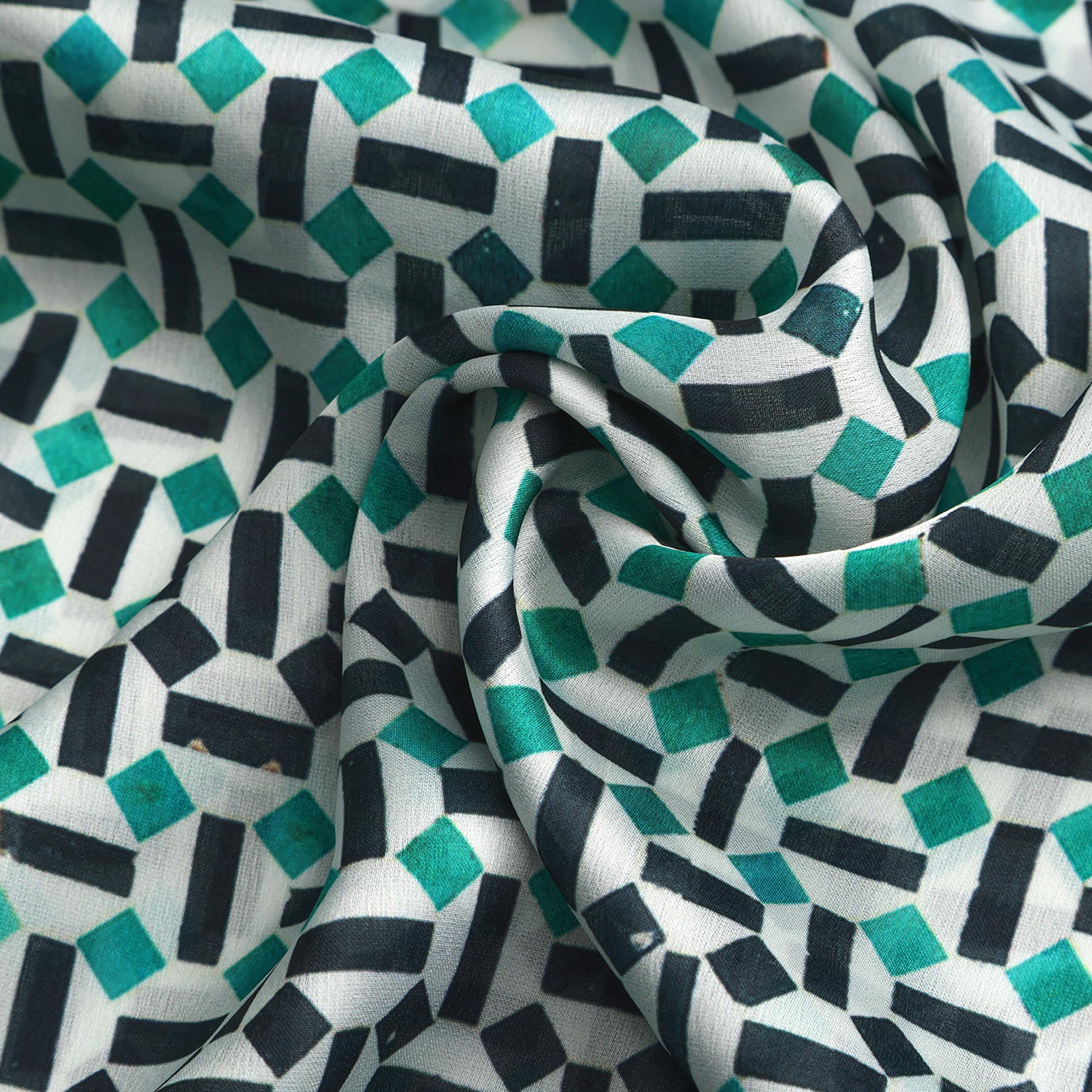 Pañuelo Sukun – estampado de mosaico andalusí en turquesa y negro, detalle 5