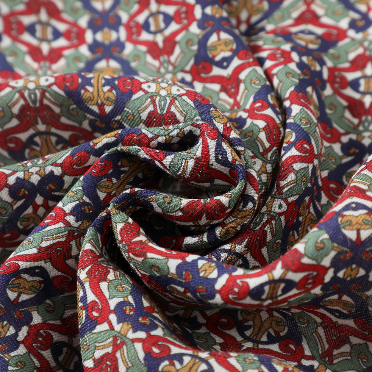 Detailed view of the Burgundy and Blue Arabesque print scarf