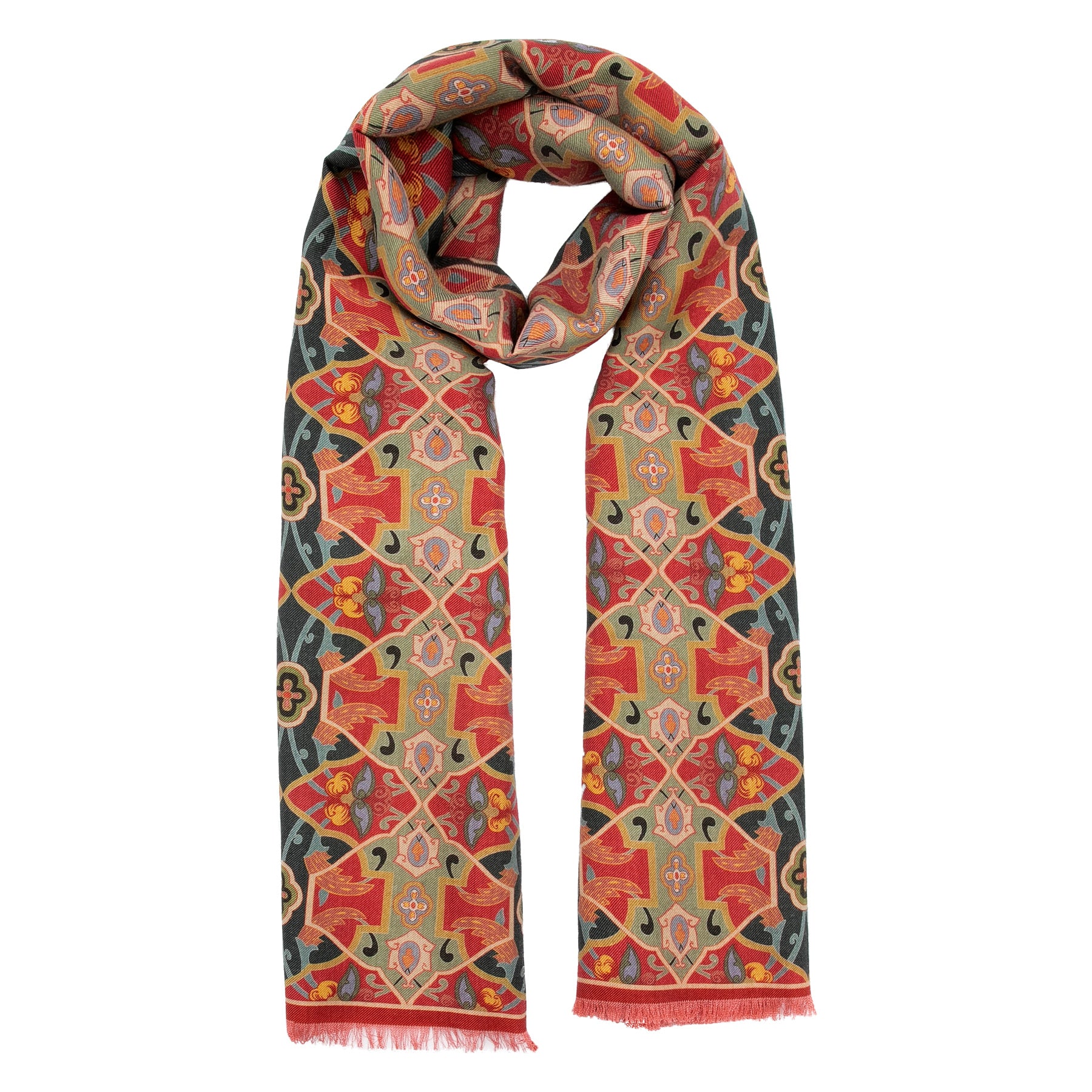 The Hamzah Silk and Wool Red Scarf Rania showcases a vibrant geometric pattern in red, blue, yellow, and beige inspired by Islamic art with diamond and floral motifs. It features a neat roll at the top and fringed edges at the bottom.