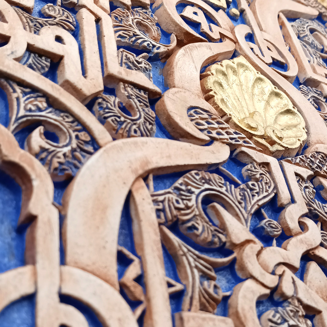 Details of decoration piece with blue and gold touches inspired by the Alhambra of Granada