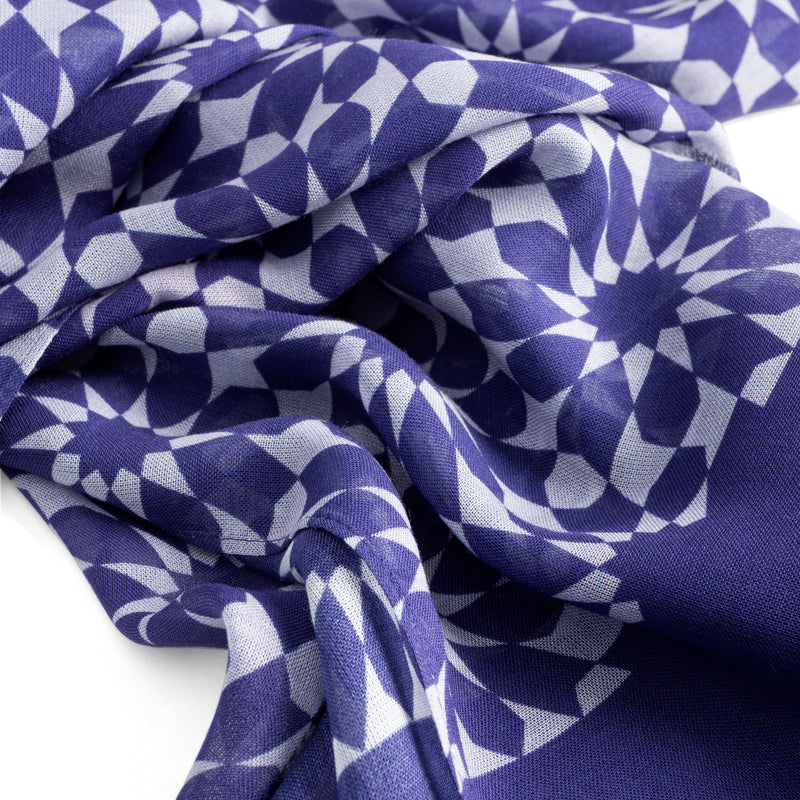 Detail of blue and gray scarf inspired by Moorish tiles