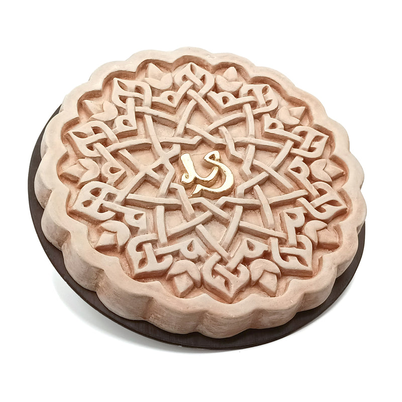 Islamic geometry plaque made of plaster and wood
