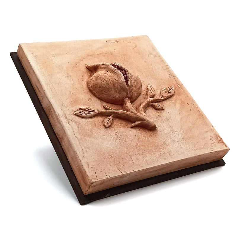 Pomegranate representing the motif of Granada made with wood and plaster for wall decor