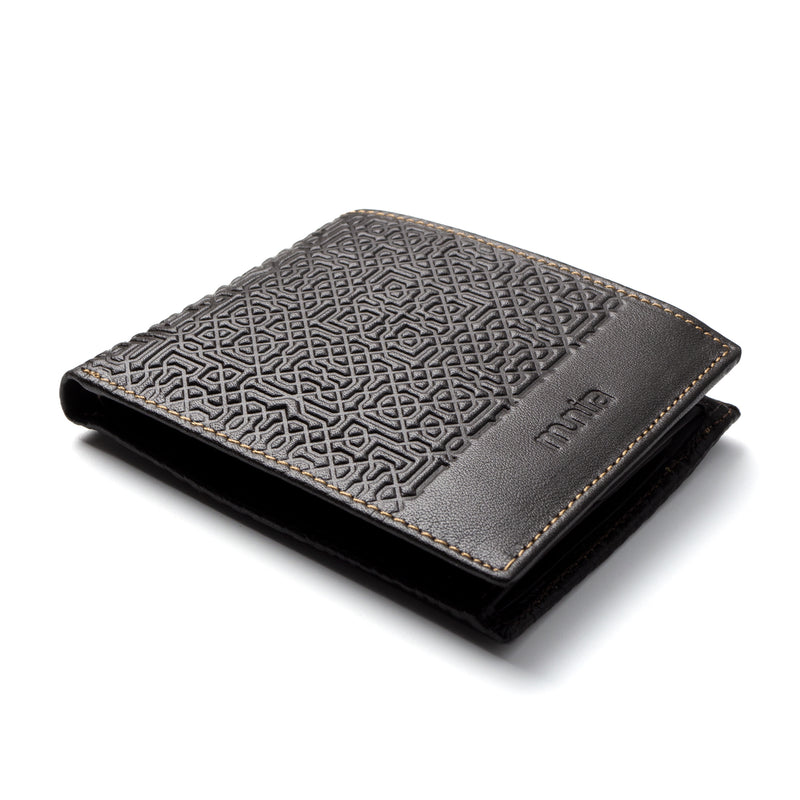 Dark brown bifold leather wallet with geometric embossed pattern inspired by Islamic Art