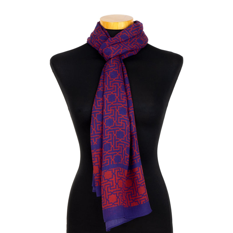 Blue and red neck scarf with geometric print inspired by Islamic geometry patterns