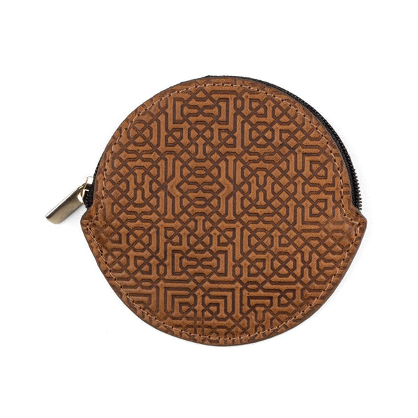 Brown leather purse with round shape embossed with islamic art pattern