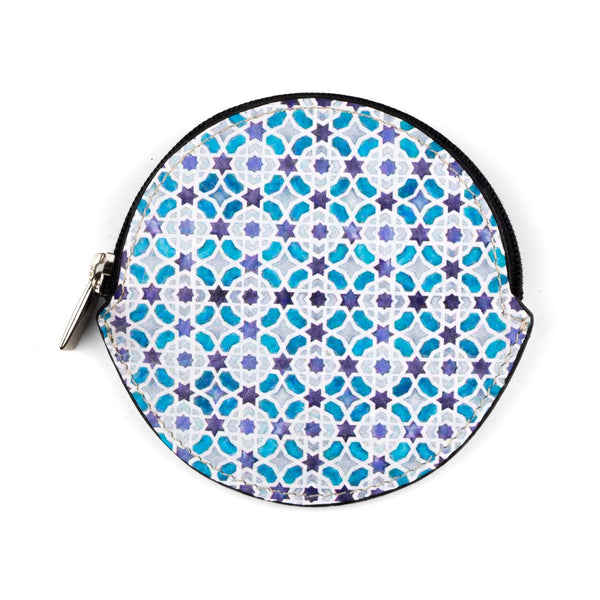 Round leather coin purse with printed design inspired by Islamic patterns