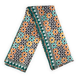 Orange and green silk scarf with geometric print inspired by moorish tiles